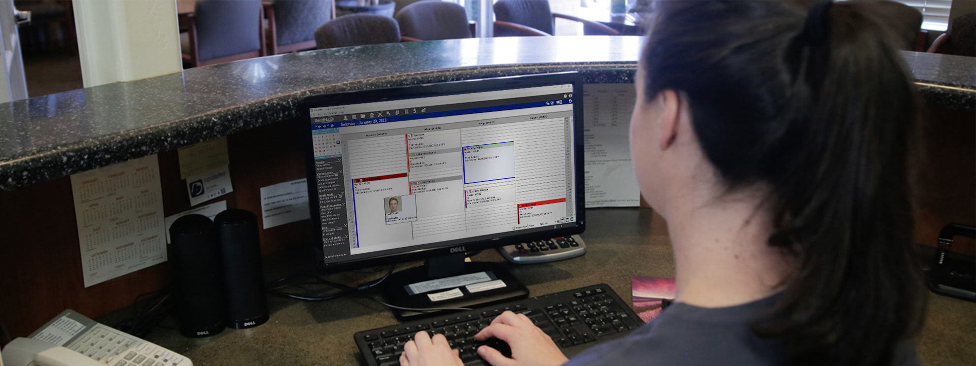 Image of Person Using DentiMax Dental Software