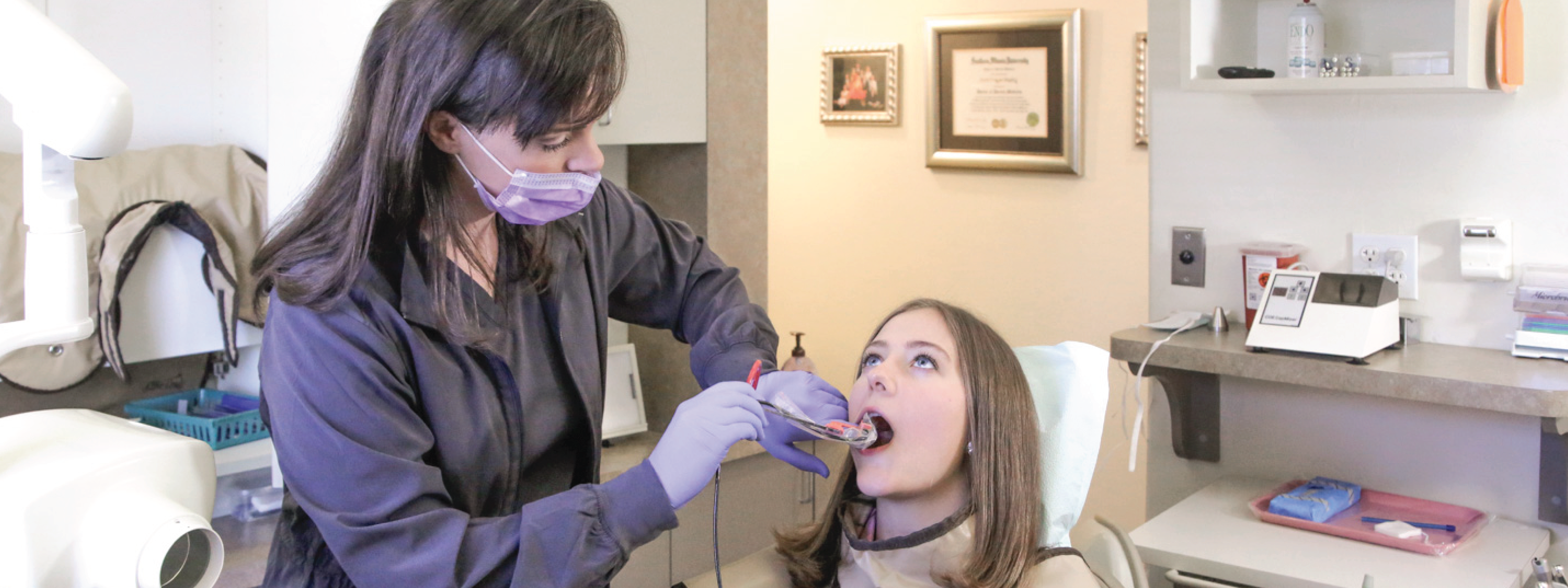 Image of Dentist Using Dental Sensor